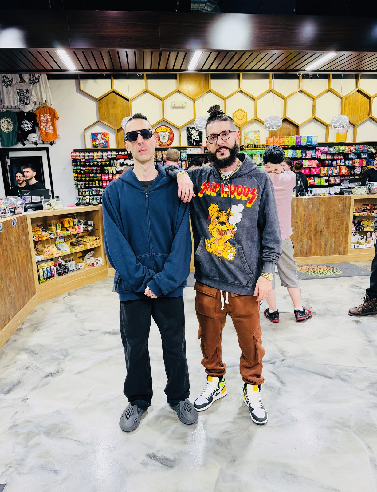 KING T and LUSS inside a shop