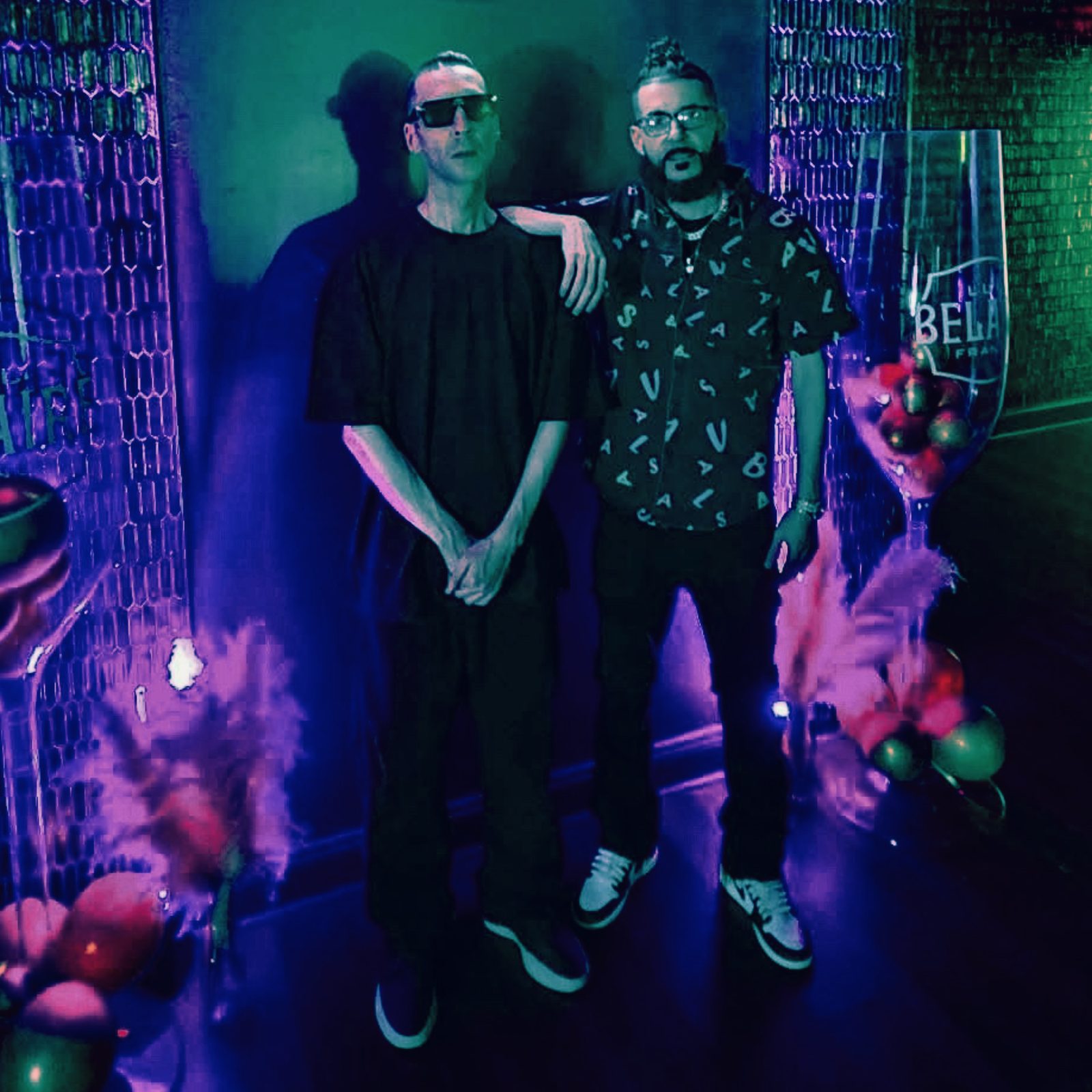 KING T and LUSS at a Luc Belaire event under purple light