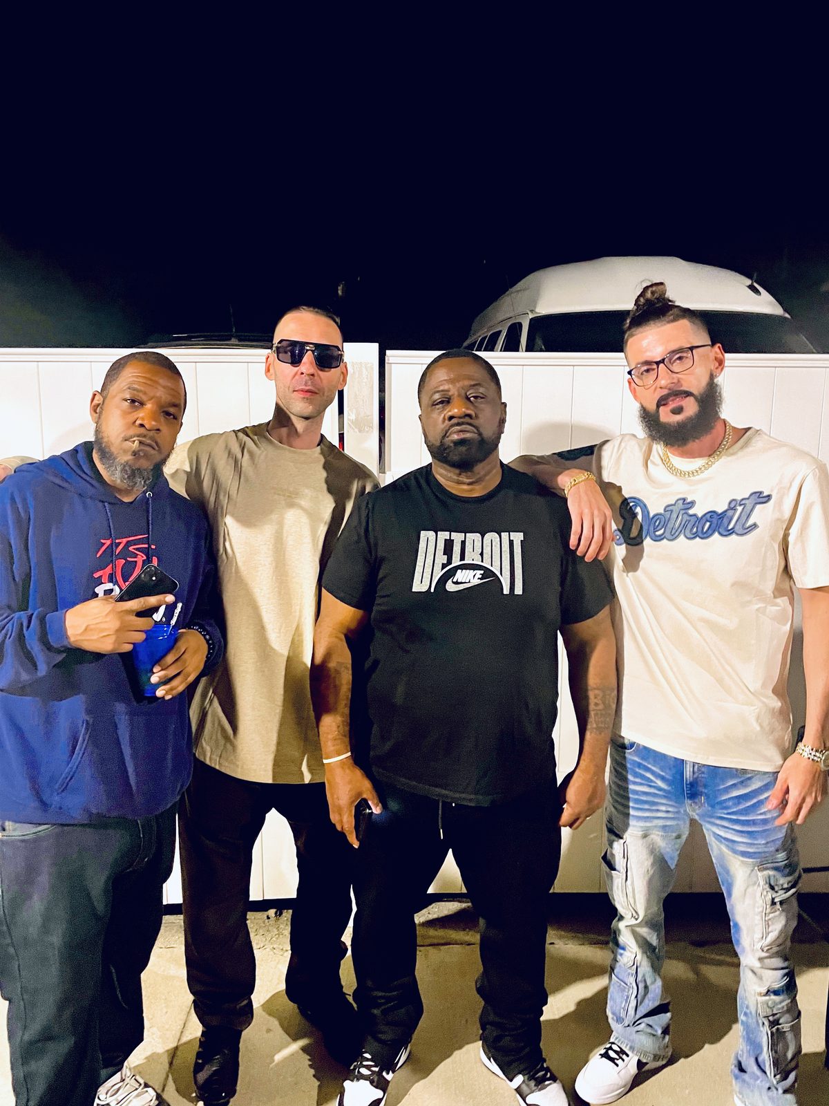 KING T and LUSS with Big Herk at night in Detroit