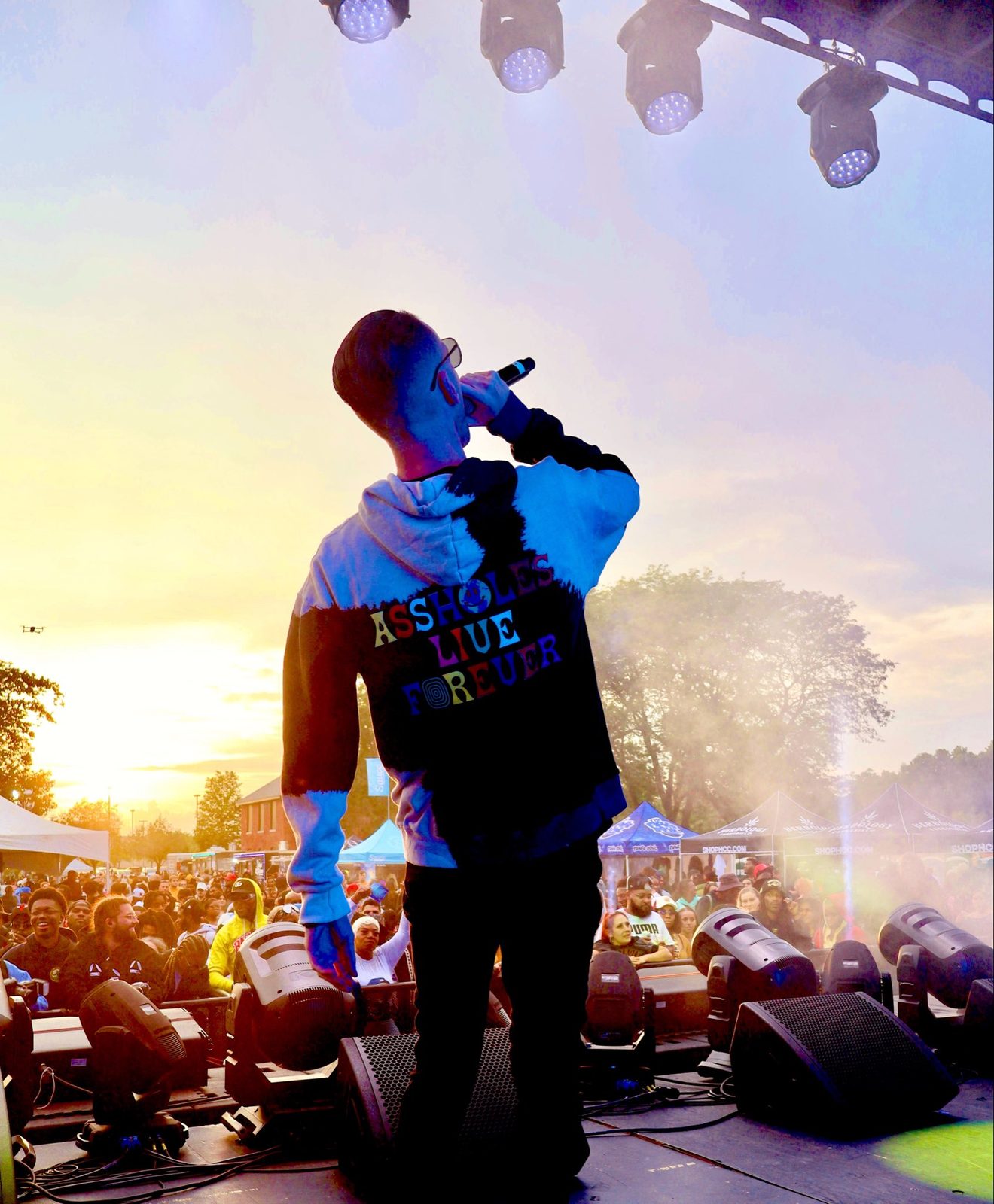 Performing at sunset with a mic