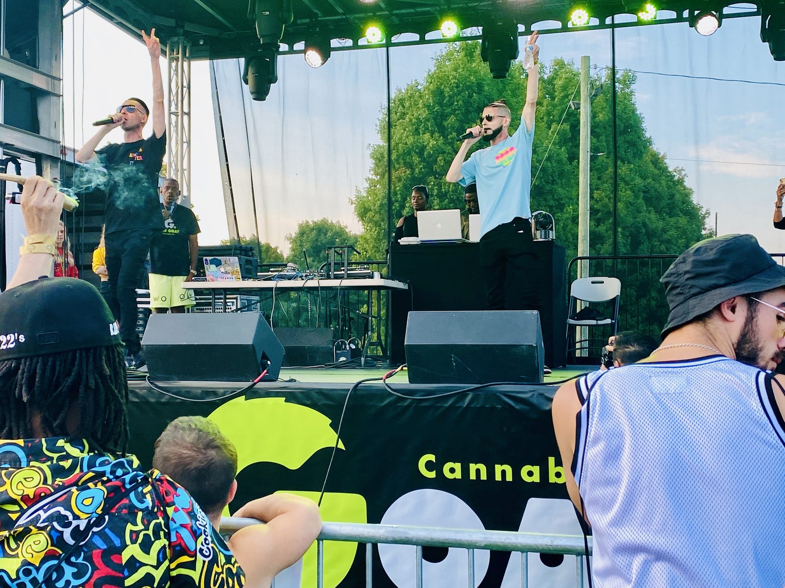 TNL on stage above the crowd